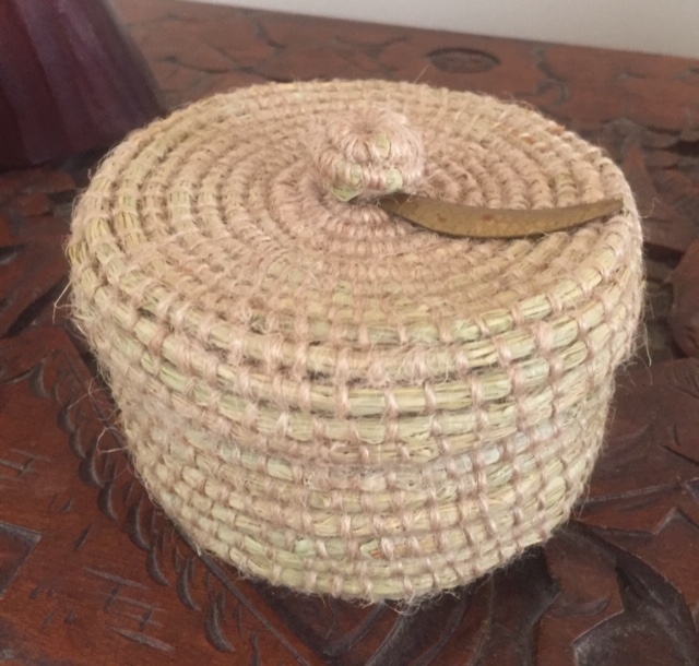 Raffia lidded Basket with Brass leaf decoration